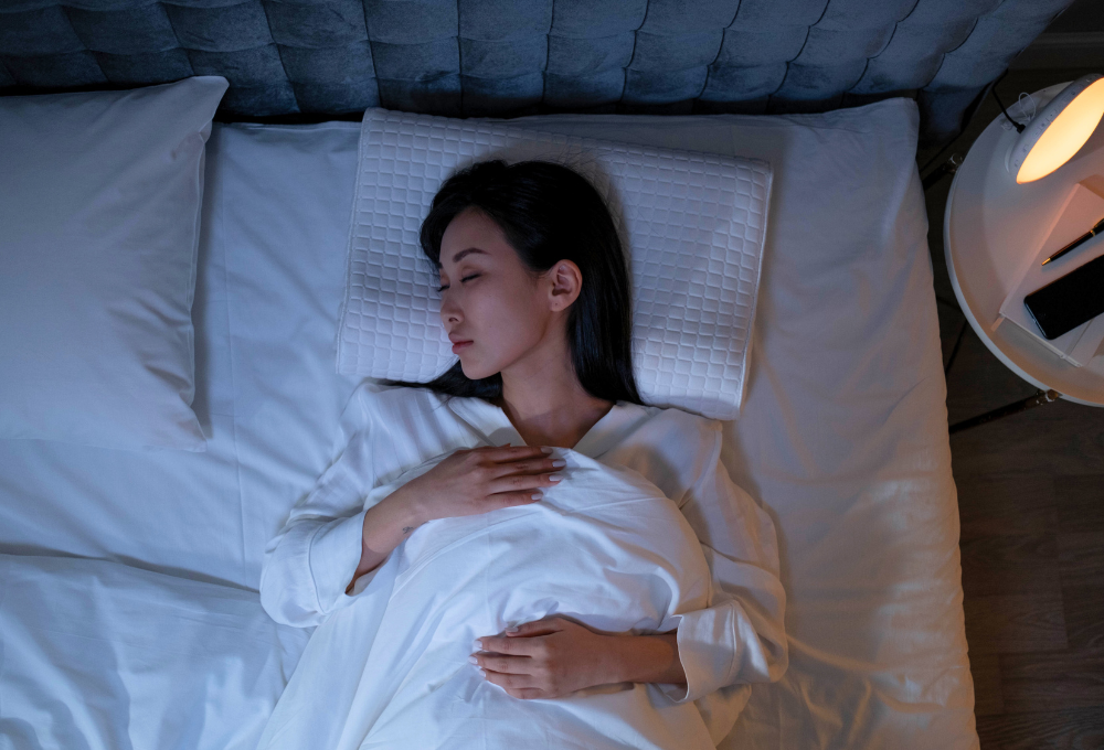 a lady getting deep sleep in bed